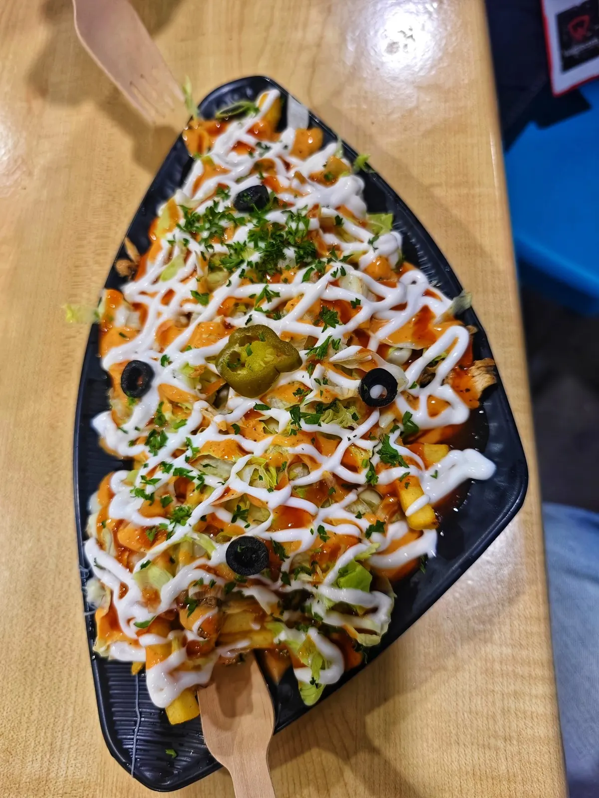 Loaded chips topped with cheese and sauce