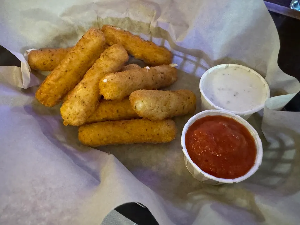 Crispy fried cheese bites with dips