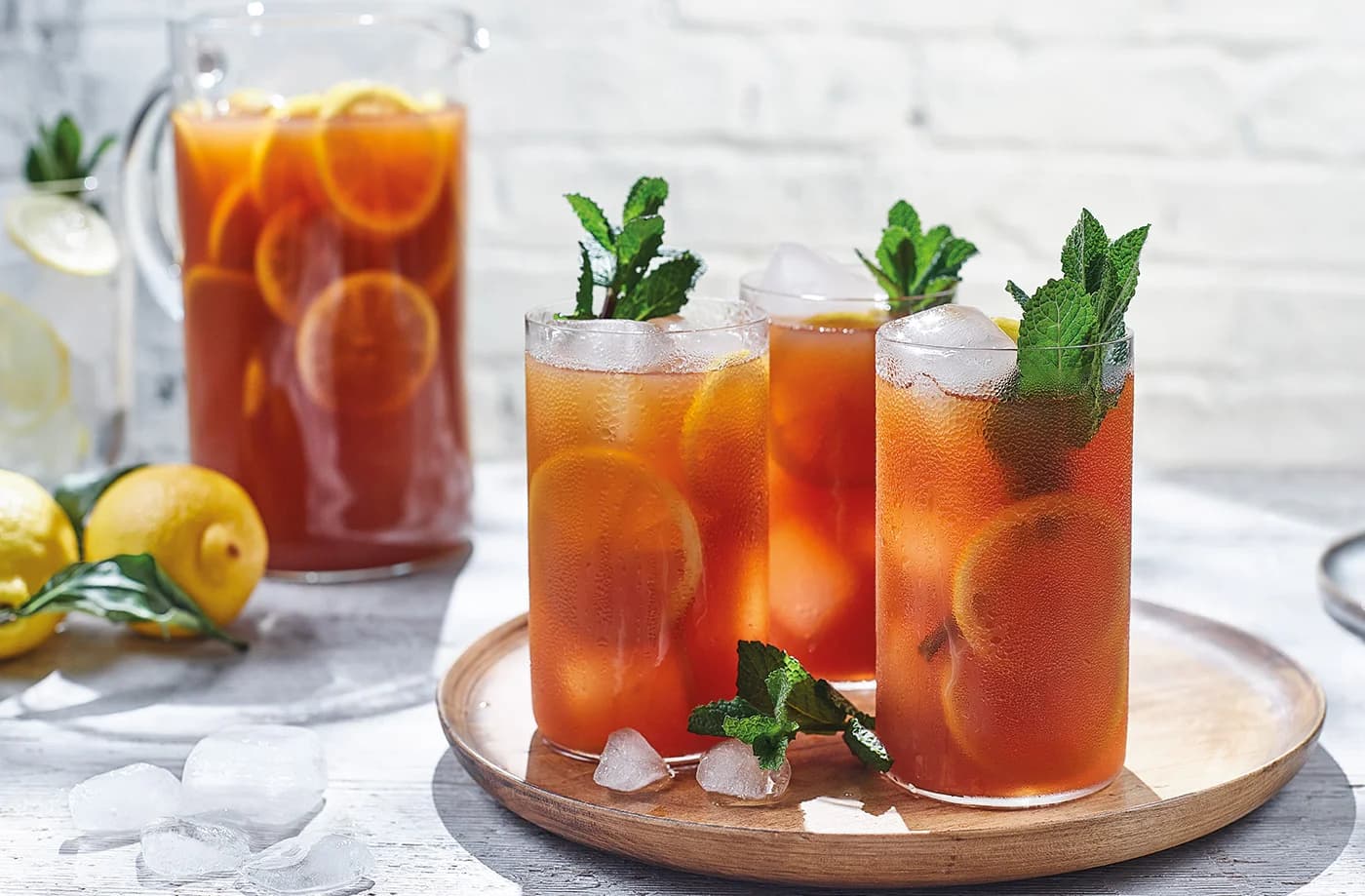 A takeaway cup of iced drink with a straw